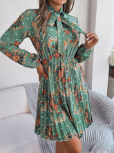 Load image into Gallery viewer, Pleated Printed Tie Neck Long Sleeve Dress
