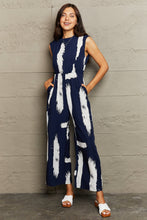 Load image into Gallery viewer, Perfee Printed Round Neck Cutout Jumpsuit with Pockets