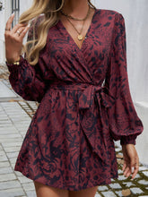 Load image into Gallery viewer, Devine Tied Surplice Long Sleeve Romper
