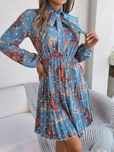 Load image into Gallery viewer, Pleated Printed Tie Neck Long Sleeve Dress
