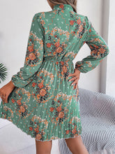 Load image into Gallery viewer, Pleated Printed Tie Neck Long Sleeve Dress
