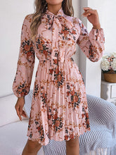 Load image into Gallery viewer, Pleated Printed Tie Neck Long Sleeve Dress
